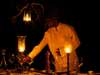 Amara Selous - waiter laying table